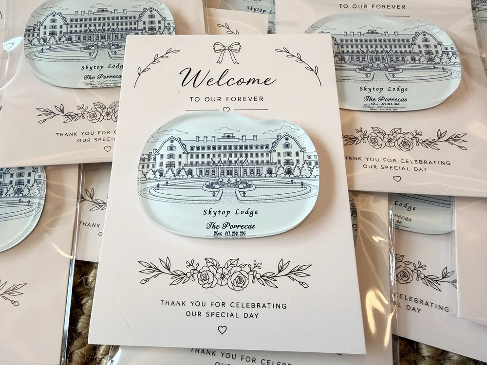Skytop Lodge acrylic wedding magnet with blue-gray venue linework on a blush welcome and thank-you card