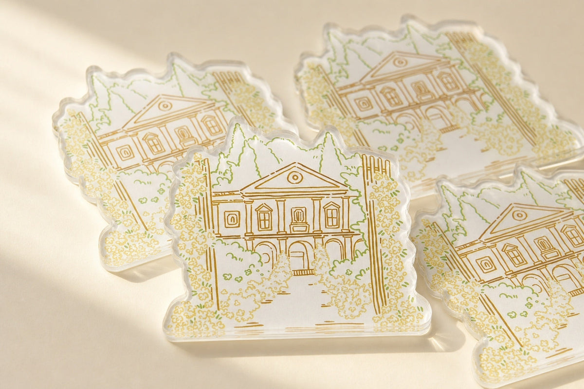 Clear-edge custom acrylic magnet showing detailed printed venue artwork