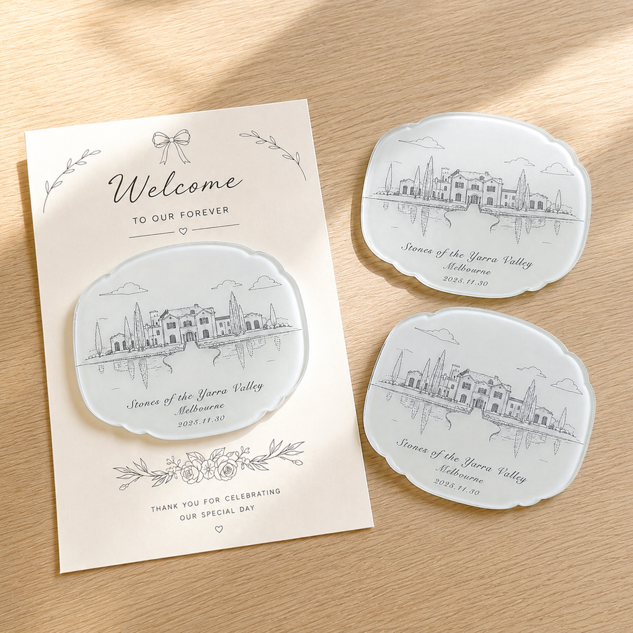 Wedding venue sketch acrylic magnets with welcome backing card on wood table
